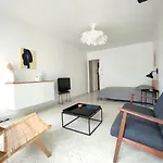 Cocon traversant deux balcons proche centre