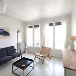 Cocon traversant deux balcons proche centre