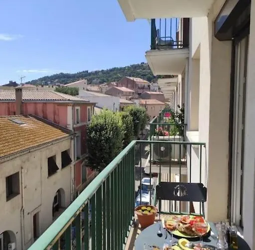 Cocon traversant deux balcons proche centre